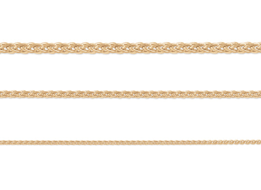 A set of three 14K yellow gold wheat chains with different thicknesses, displayed horizontally.