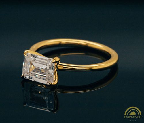 East-West Emerald Cut Diamond Solitaire Engagement Ring Mounting in Fairmined Yellow Gold