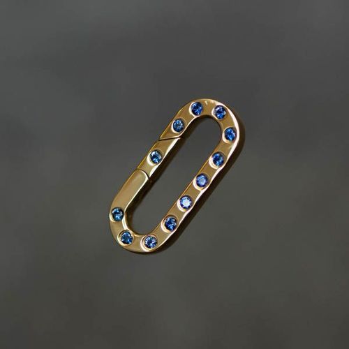Elongated Flat Paper Clip Invisible Clasp in yellow gold with blue sapphires