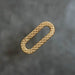 Elongated Flat Paper Clip Invisible Clasp in snakeskin textured yellow gold from RIVA Precision