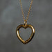 Heart-Shaped Invisible Clasp with bale in high polish yellow gold from RIVA Precision