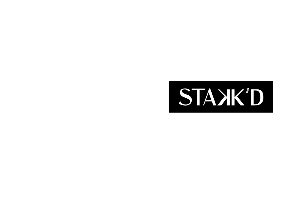 Black 'STAKK'D' logo on a white background
